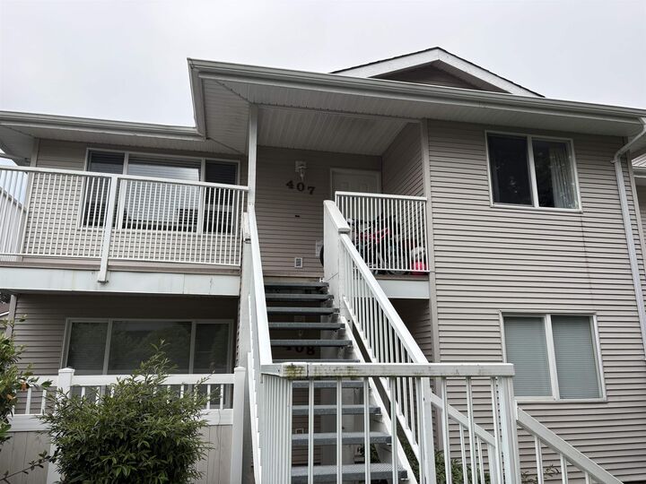Property Photo: 13963 72 Avenue 407 BC V3W 2P6