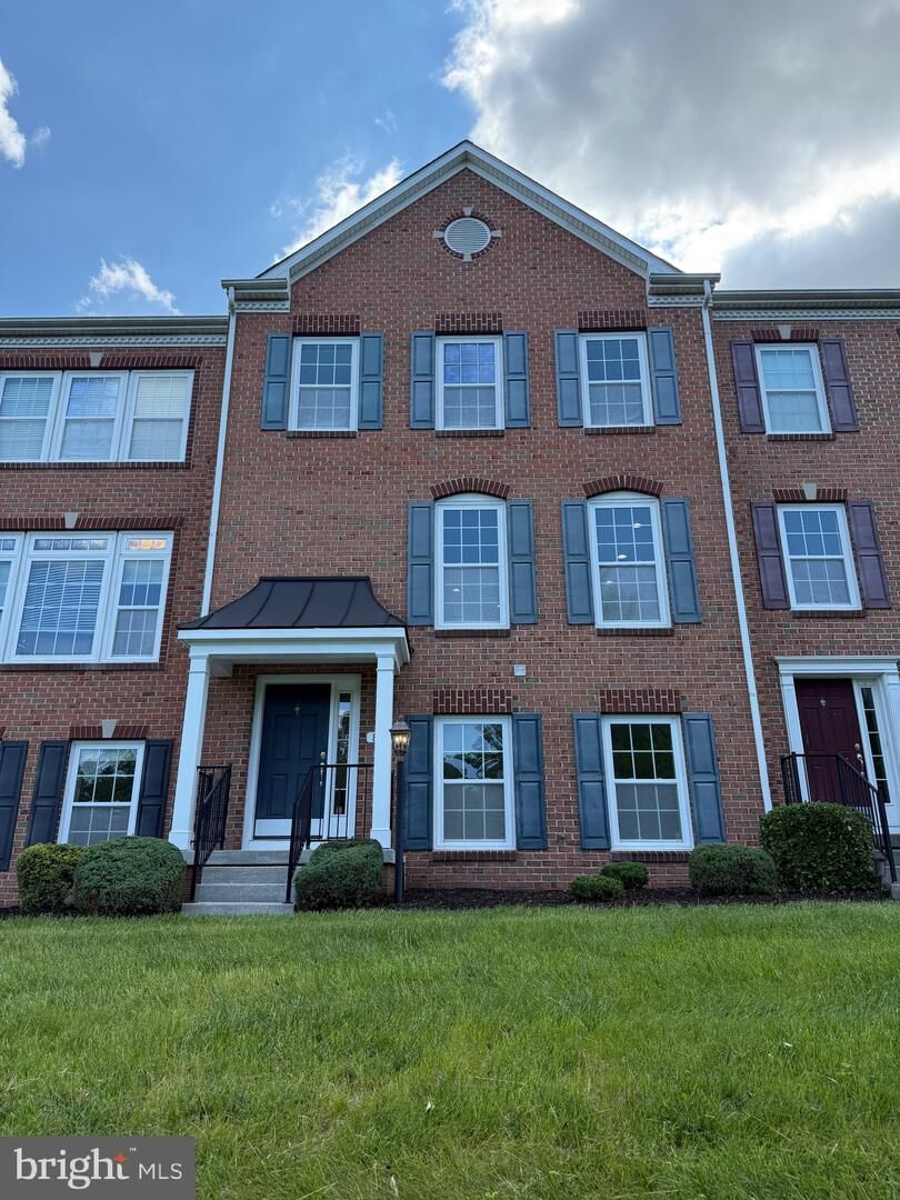 Property Photo:  8852 Purple Iris Lane 16  MD 21075 