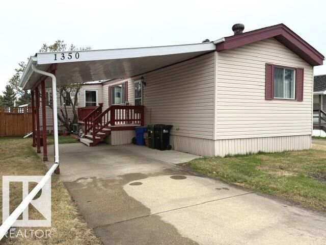 Property Photo:  1350 Lakewood Crossing  AB T8H 1L2 
