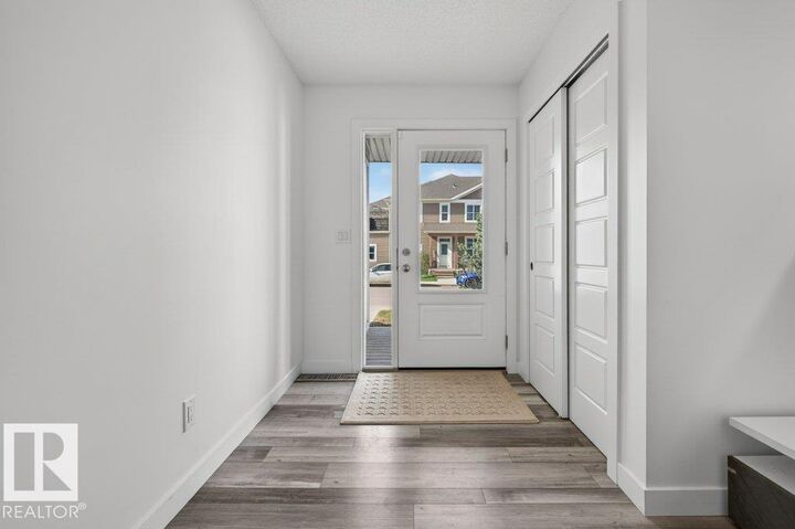 Property Photo:  20315 16 Avenue NW  AB T6M 1K8 