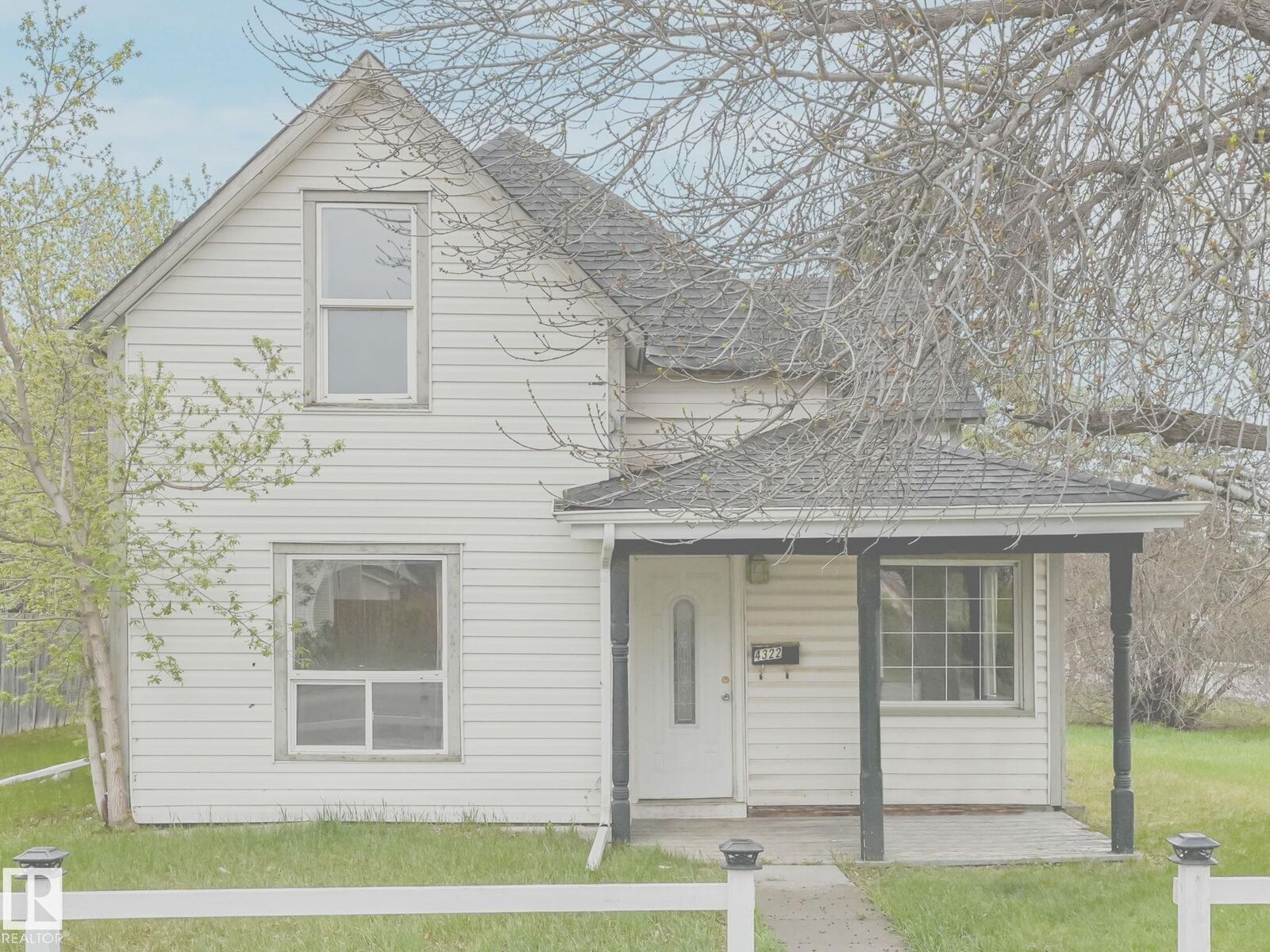 Property Photo:  4322 53 Street  AB T9A 1R1 