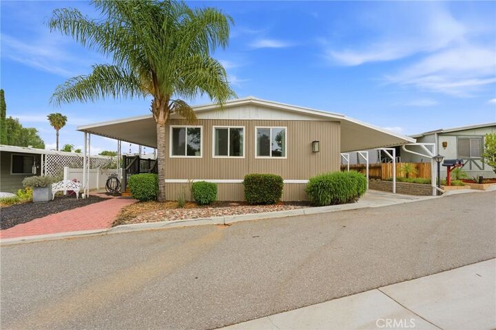 Property Photo: 15181 Van Buren Blvd 57 CA 92506