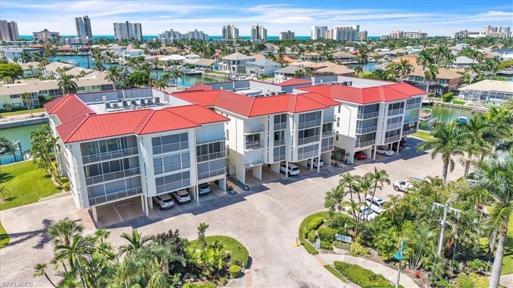 Property Photo:  848 Collier Ct 304  FL 34145 