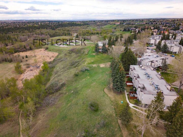 Property Photo:  13104 Elbow Drive SW 1402  AB T2W 2P2 