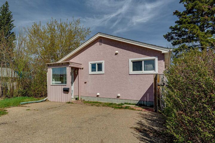 Property Photo:  4212 C + E Trail  AB T4L 1V8 