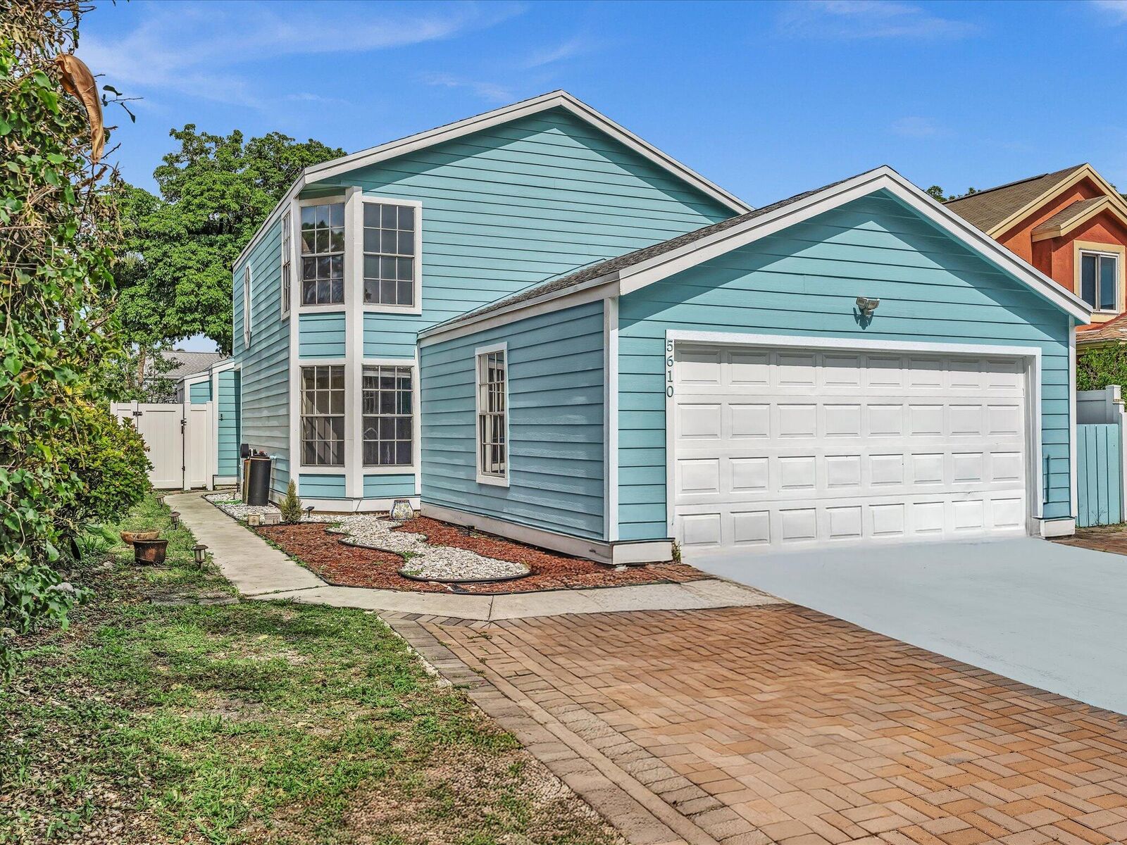 Property Photo:  5610 Dewberry Way  FL 33415 