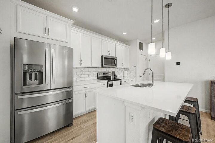 Property Photo:  13657 Ash Circle  CO 80602 