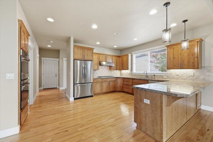 Property Photo:  6107 S Windstar St  WA 99224 