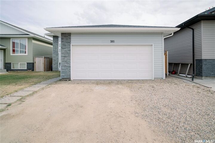 Property Photo:  205 Reddekopp Lane  SK S0K 4S3 