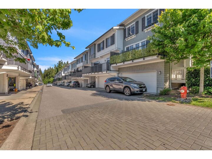Property Photo: 8130 136A Street 130 BC V3W 1H9