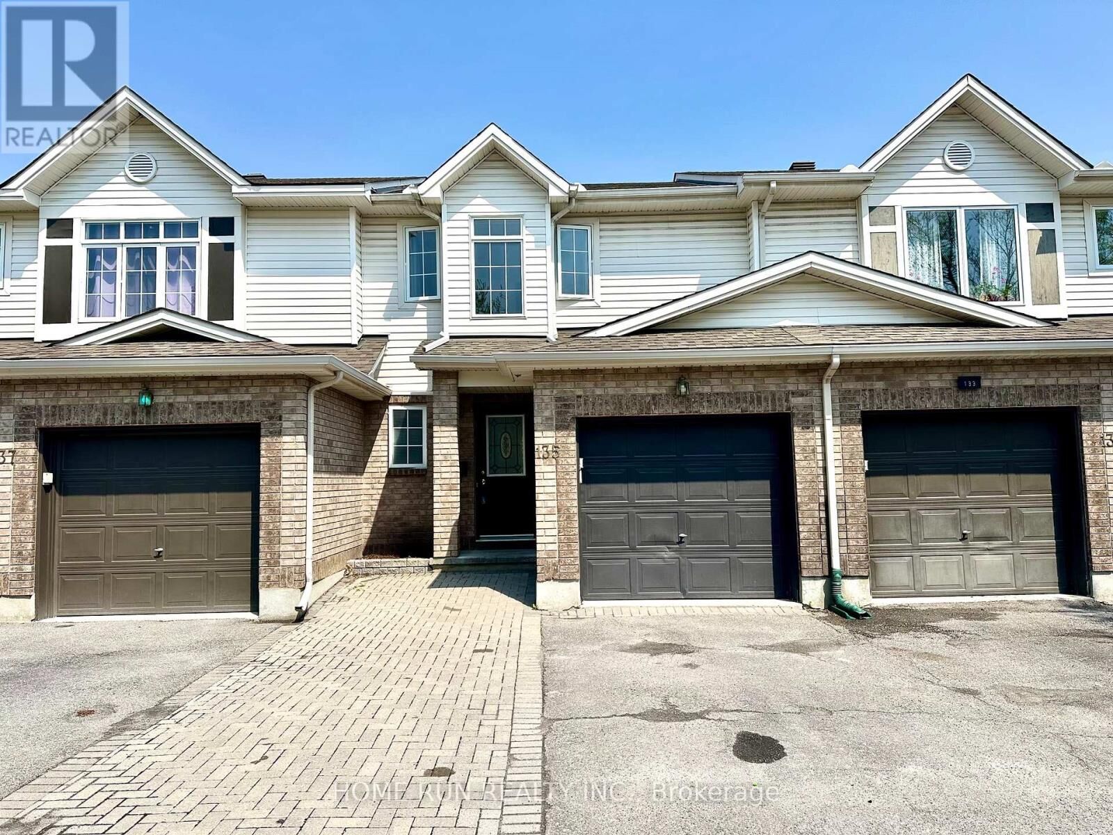 Property Photo:  135 Kinross Private  ON K2K 3P9 