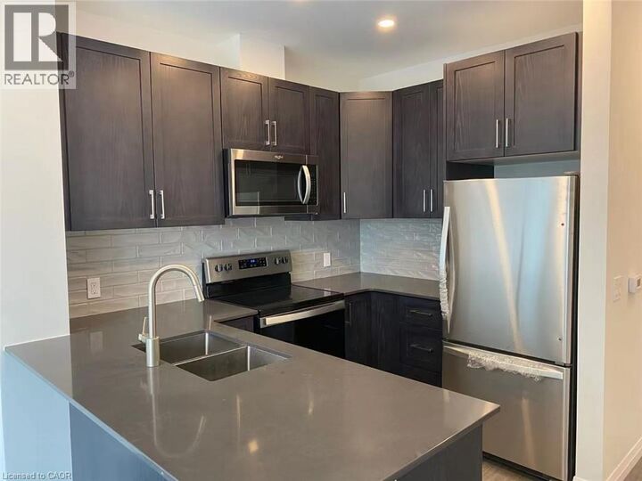 Property Photo:  104 Garment Street 1705  ON N2G 0C8 