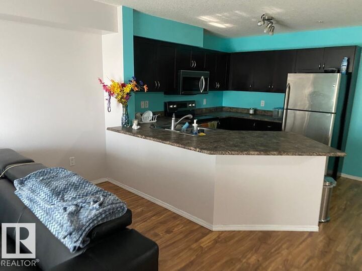 Property Photo:  42 Summerwood Boulevard 117  AB T8H 0C3 