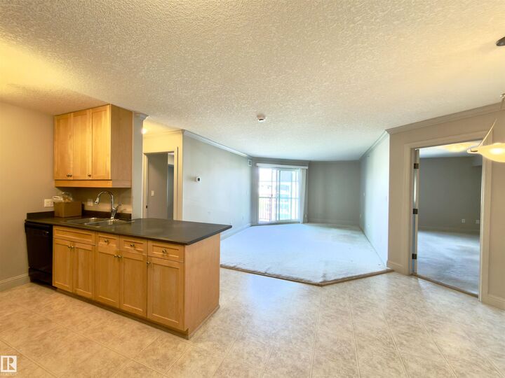 Property Photo: 13111 140 Avenue NW 428 AB T6V 0B1