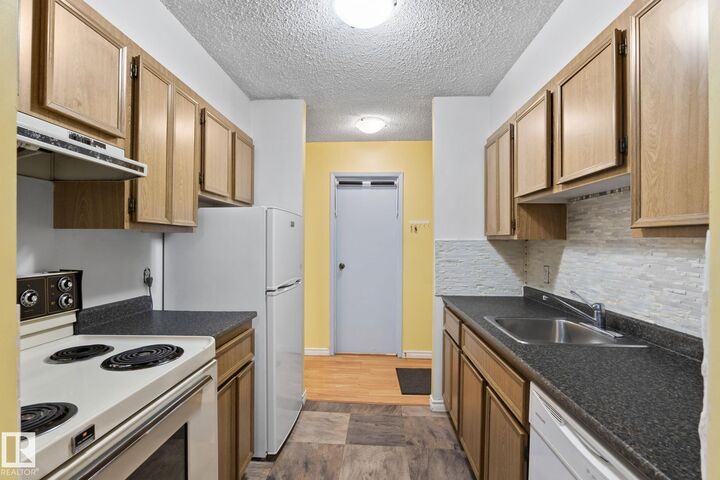 Property Photo:  12841 65 Street NW 712  AB T5A 4N4 