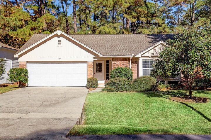 Property Photo:  12 Fairmeade Bend Drive  TX 77381 
