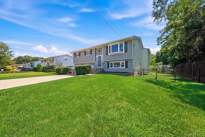 Property Photo:  58 Oakridge Drive  NY 11706 