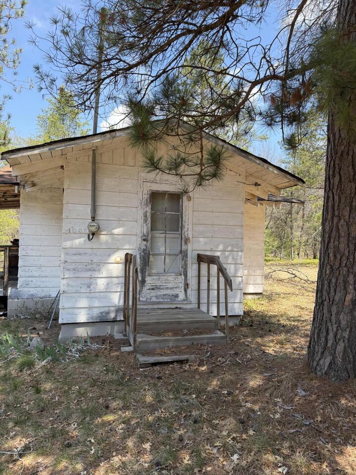 Property Photo:  4066 Palmer Road  MI 48636 