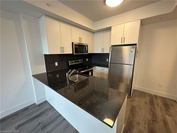 Property Photo: 103 Roger Street 213 ON N2J 0G2