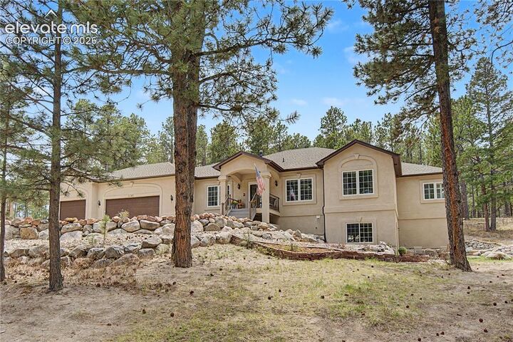 Property Photo:  1245 Old Antlers Way  CO 80132 