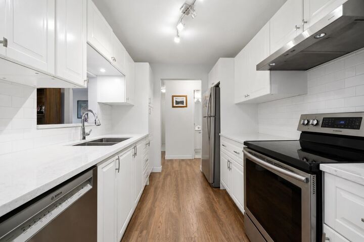 Property Photo: 20200 54A Avenue 106 BC V3A 3W7