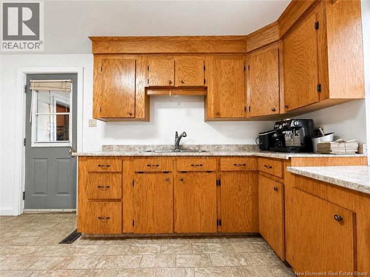 Property Photo:  37 St-Jean Baptiste Street  NB E4S 3W1 