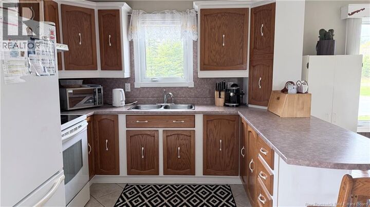 Property Photo:  7063 Ch Boundary  NB E7A 1J9 