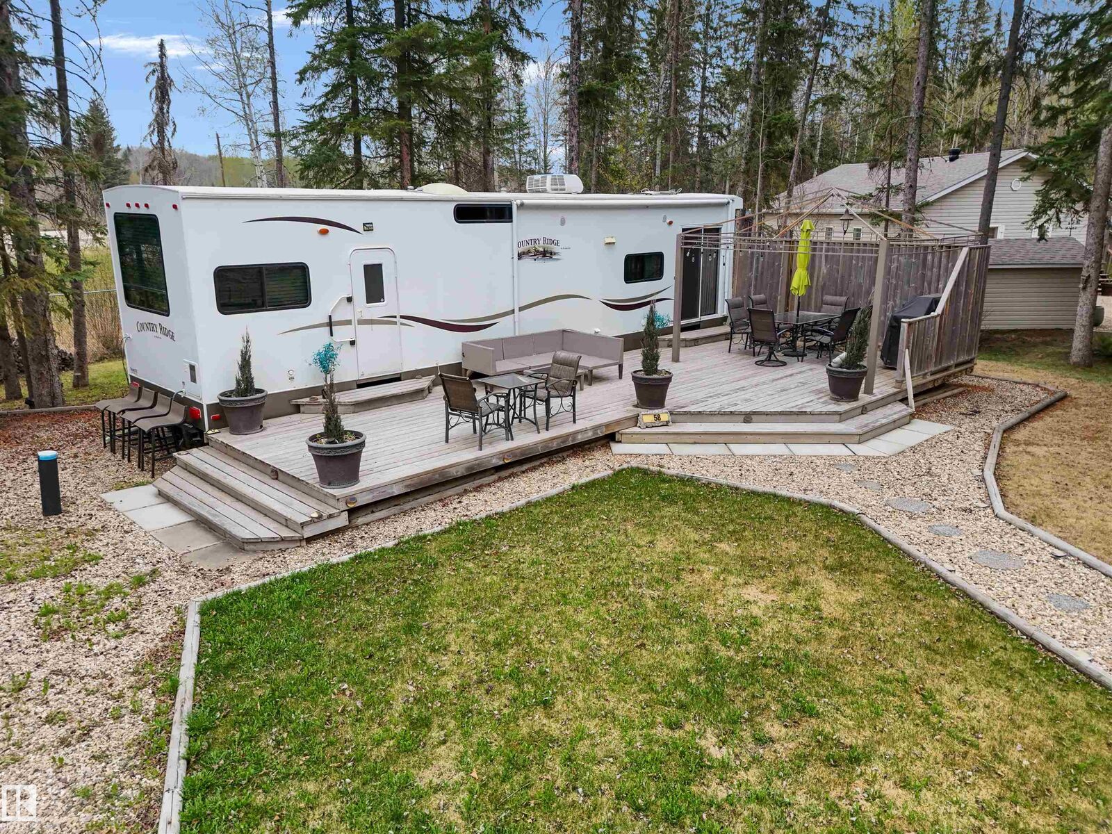 Property Photo:  158 Birchwood Country Condo  AB T0C 1W0 