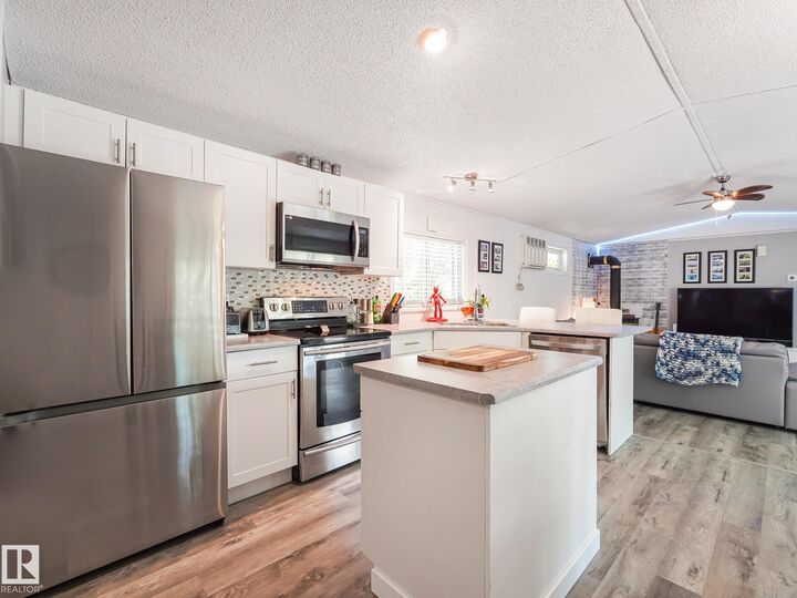 Property Photo:  304 57323 Rgrd 30  AB T0E 1A0 