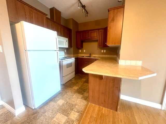 Property Photo: 9225 Lakeland Drive 301 AB T8X 0B8