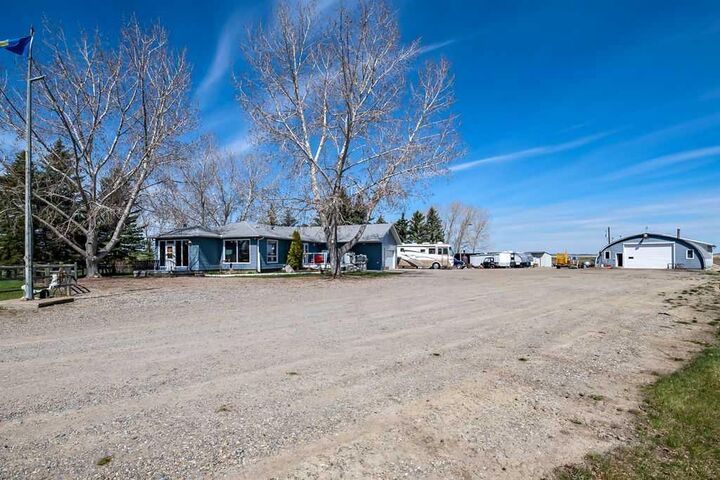 Property Photo:  32126 Coal Trail W  AB T1V 1M6 