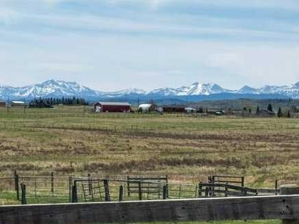 Property Photo:  370065 128 Street W  AB T1S 6B8 
