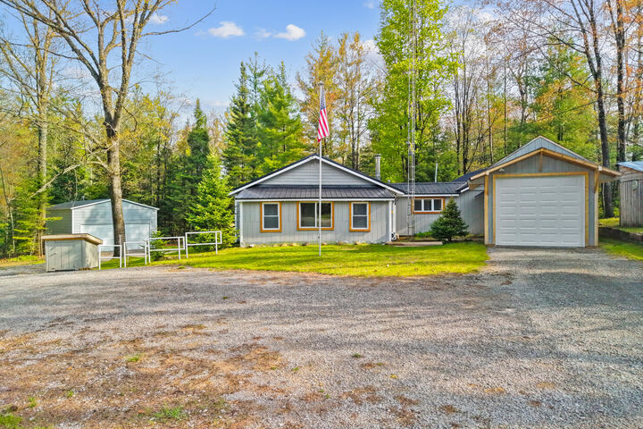 Property Photo:  19430 Carter Road  MI 49746 