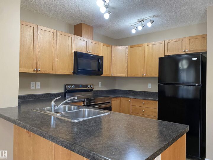 Property Photo: 6411 18 Avenue SW AB T6X 0M8