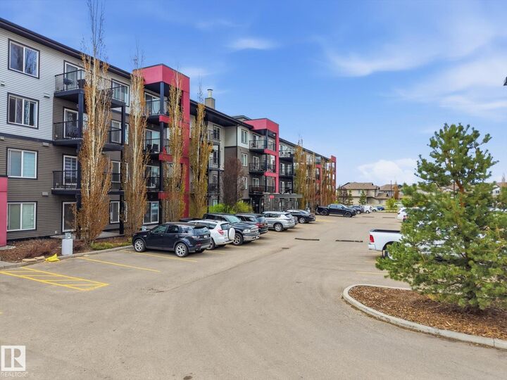 Property Photo: 5521 7 Avenue SW 302 AB T6X 2A8