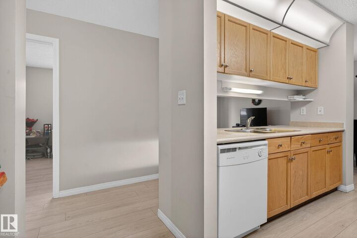 Property Photo:  4210 139 Avenue NW 129  AB T5Y 2W6 