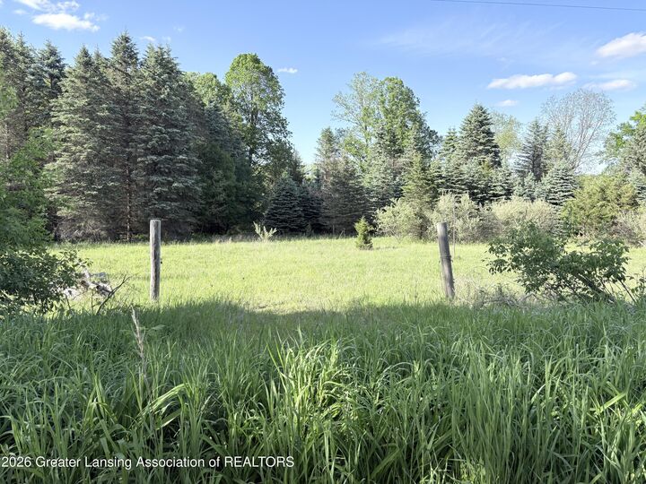 Property Photo:  18 E Riverside Drive  MI 48846 