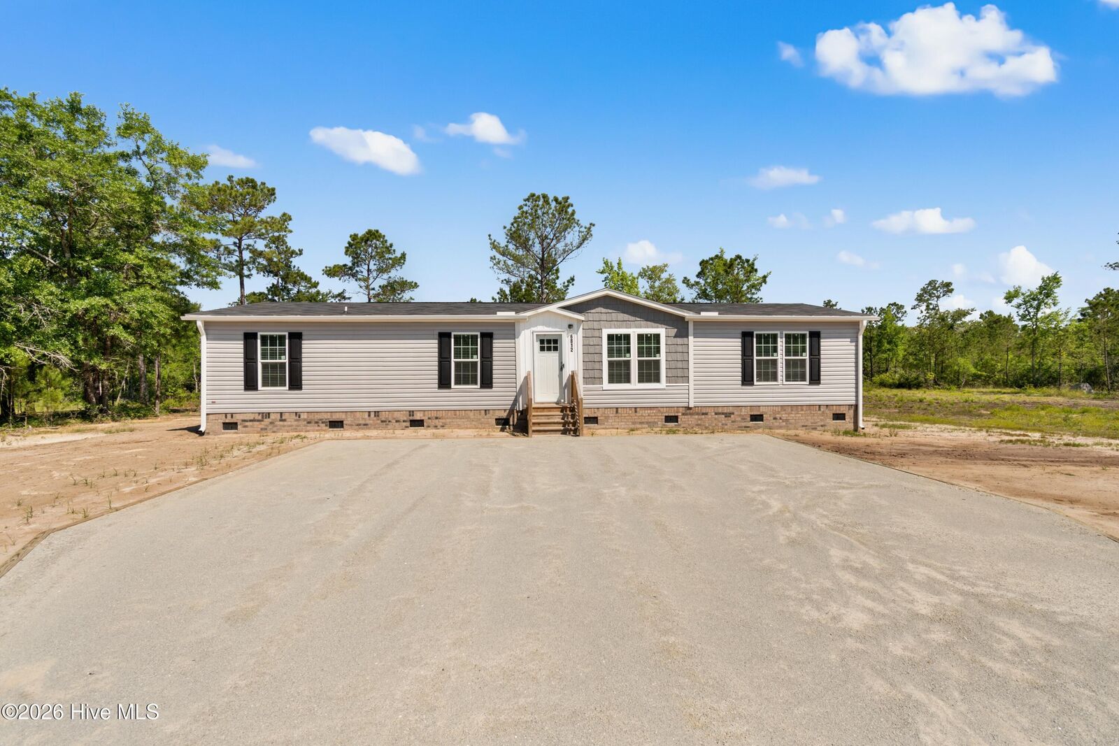 Property Photo:  6812 Lewis Drive SE  NC 28479 