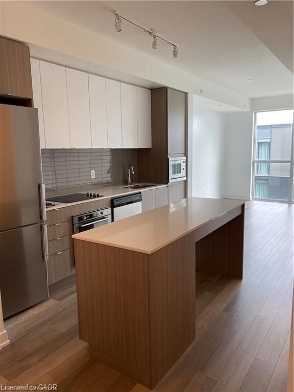 Property Photo:  5220 Dundas Street 412  ON L7R 3X4 