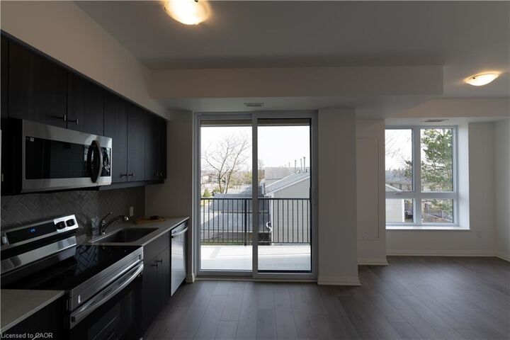 Property Photo: 101 Golden Eagle Road 215 ON N2V 0H4