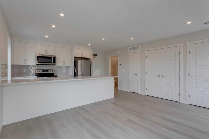 Property Photo:  40 Livingston Parade NE 202  AB T4B 3P6 