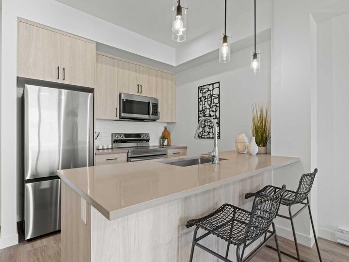 Property Photo: 2026 81 Street SW A109 AB T3H 3V9