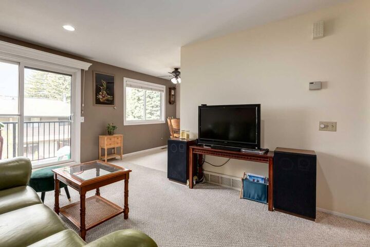 Property Photo:  5019 46 Avenue SW 56  AB T3E 6R1 