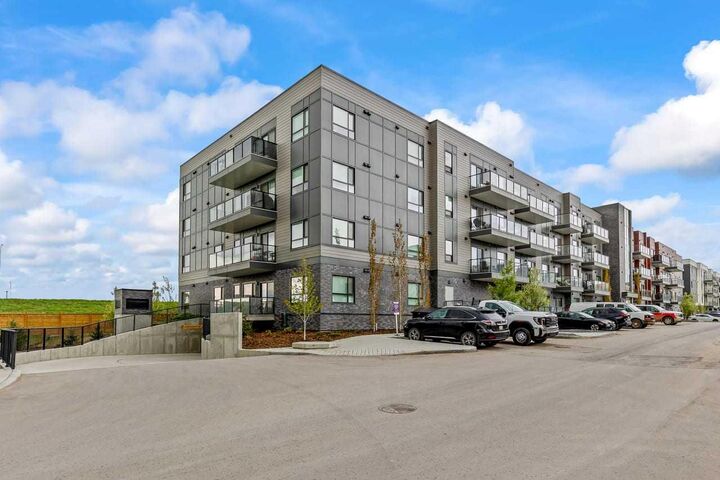 Property Photo: 20295 Seton Way SE 4104 AB T3M 2J1