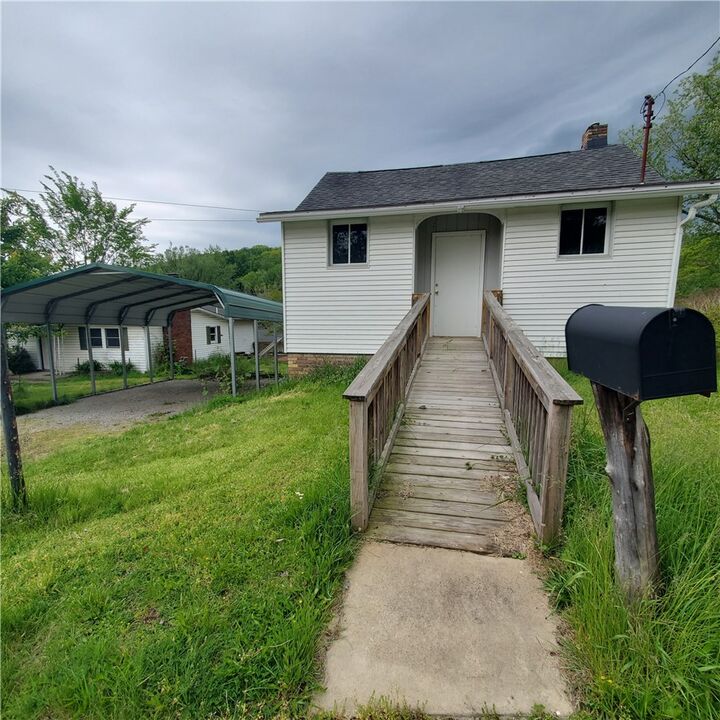Property Photo:  203 Rock Ave  PA 15010 