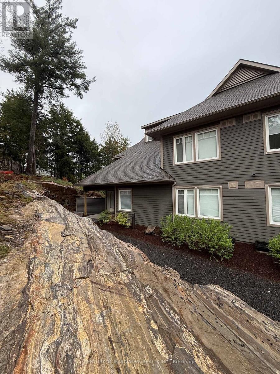 Property Photo: 13 Tree Tops Lane 104 ON P1H 1A9
