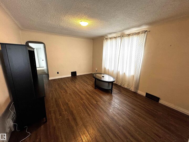 Property Photo:  9015 91 Street NW  AB T6C 3N6 