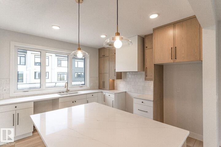 7121 May Crescent NW 53 — photo 1