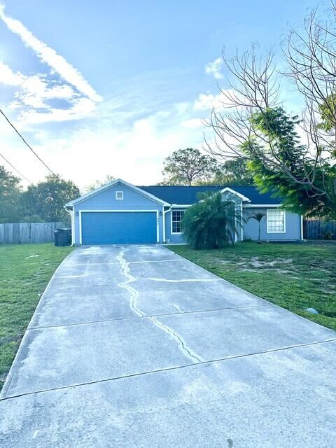 Property Photo:  1497 SW Gastador Avenue  FL 34953 