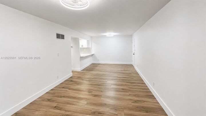 Property Photo:  5845 Washington St 65  FL 33023 